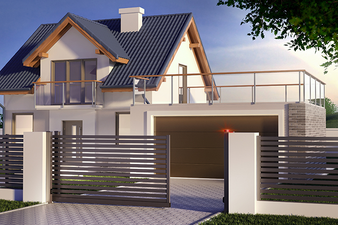 Haus mit Zaun und automatischem Tor